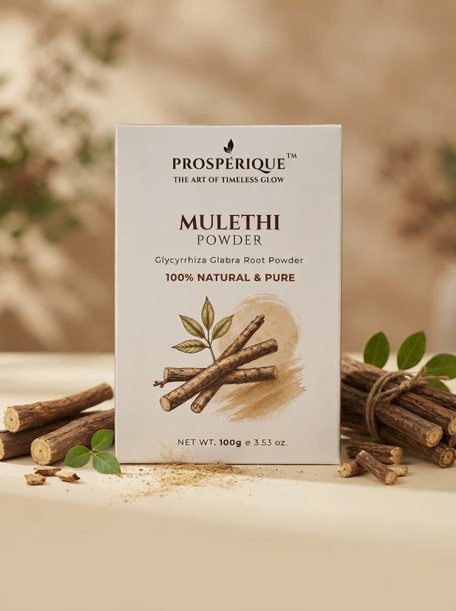 A product shot of Prosperique Mulethi powder box surrounded by raw liquorice root sticks.